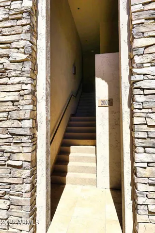 Covered entry with access to 2-car garage