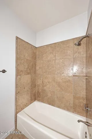 Guest bath features shower/tub combo