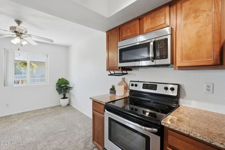 Comfortable dining area positioned within the open floor plan, ideal for casual meals or entertaining guests.