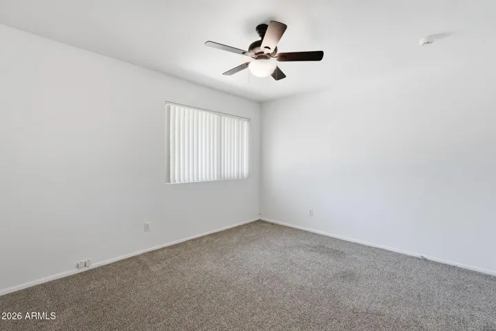 Versatile second bedroom perfect for guests, a home office, or flexible living space.
