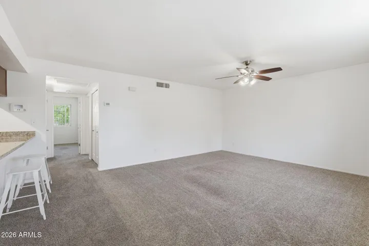 Spacious open-concept living area designed for comfortable everyday living and entertaining in this well-located Scottsdale home.
