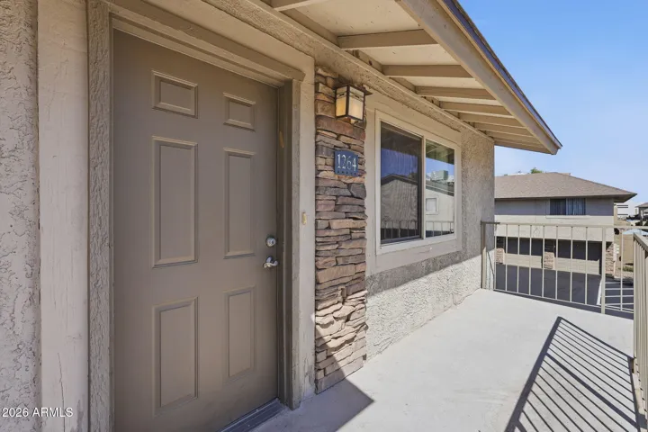 Inviting private condo entry in Scottsdale offering a welcoming first impression and easy access to the open living spaces inside.