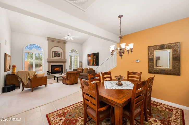 ..open dining space between kitchen and living