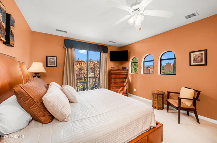 ...spacious upper-level bedroom with natural light