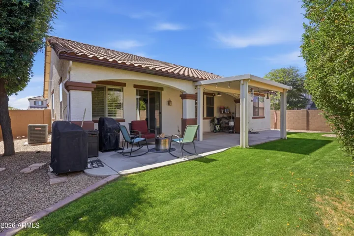 Great back yard with privacy, shade and real grass!