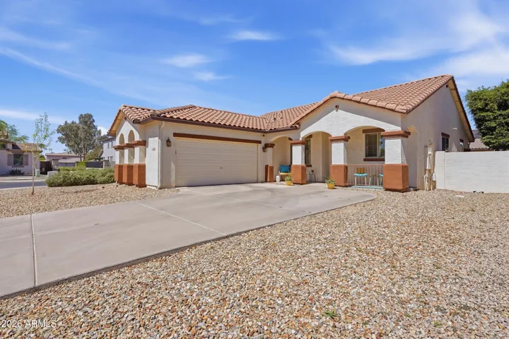 Side entry garage, CORNER LOT, easy care front landscaping all make this a great property.