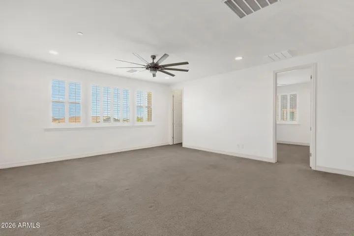 At top of staircase, great space with storage closet off to the side.