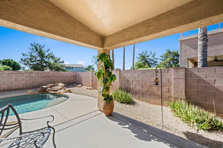 Patio overlooking the pool