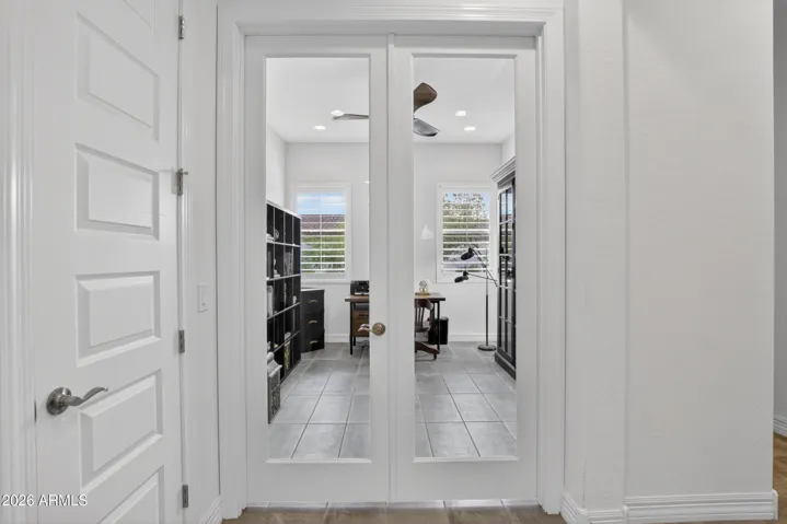 Office/flex room with 8 ft. glass French doors.