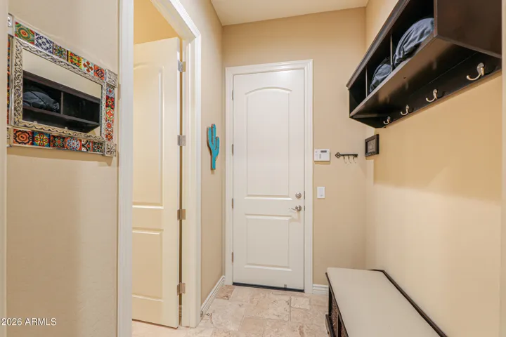 Hallway to Main Garage & 1/2-Bath