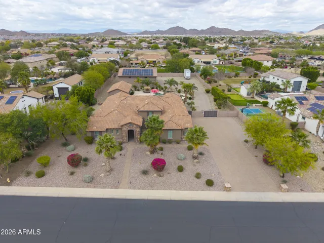 Home w/4-Car Attached & Oversized Garage, Detached Casita, & RV Garage w/Carport.