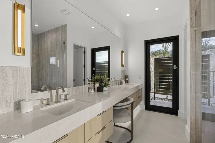 Primary bathroom double vanity with make up area