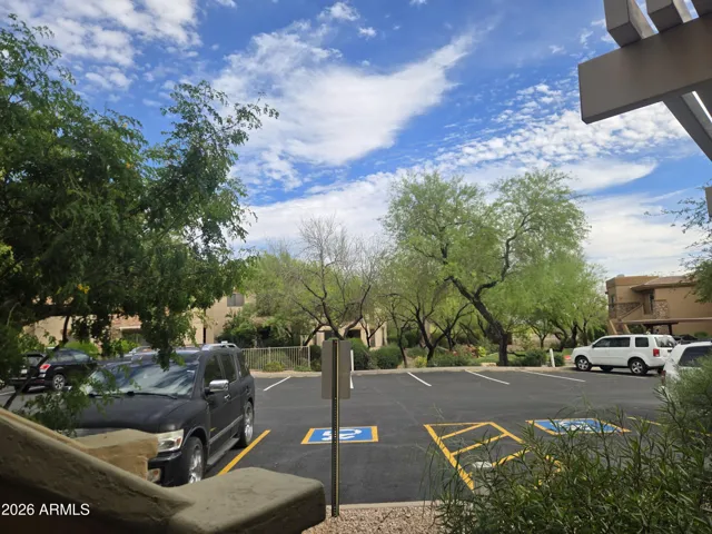 Your Assigned Covered Parking Space is 3rd on left from your door #106 PLENTY of Extra Parking for 2nd Car & Guests