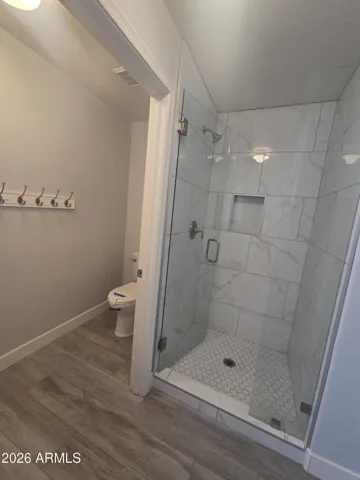 Primary Bedroom Walk In Shower & seperate toilet room