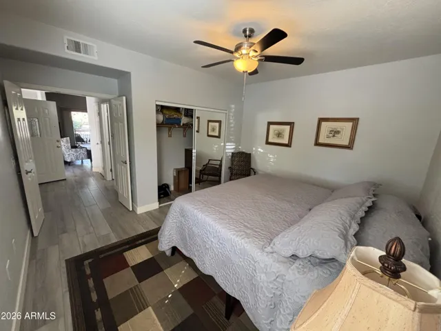 2nd Bedroom to right of entrance is spacious with French Doors and ceiling fan