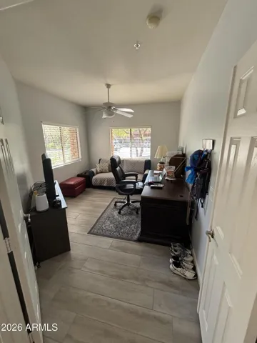3rd Bedroom/Den - to Left of entrance has great natural light thru 2 large windows, ceiling fan and French Doors