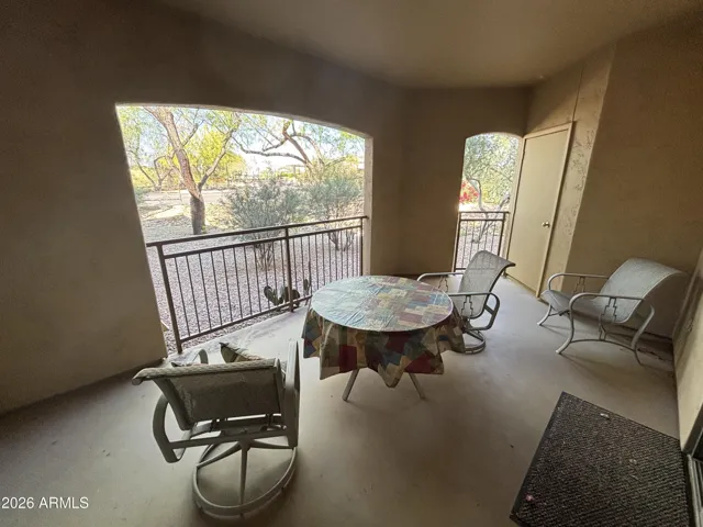 Large West covered patio has storage closet