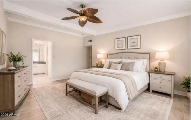 Primary bdrm with virtually staged & updated floor and furniture