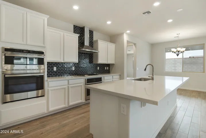 PHOTOS ARE OF ANOTHER HOME OF THE SAME PLAN. SEE SELECTION PHOTO. THIS HOME HAS A GOURMET KITCHEN