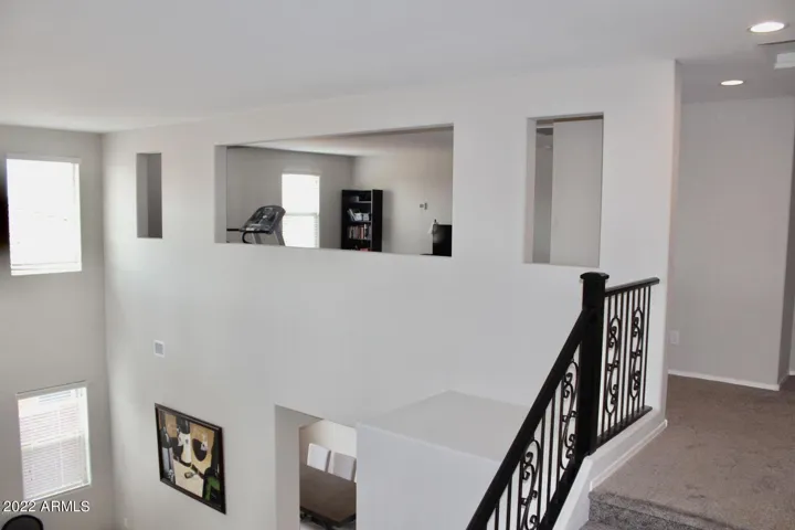 A game room down AND a loft up?! LOTS of space for everyone.
