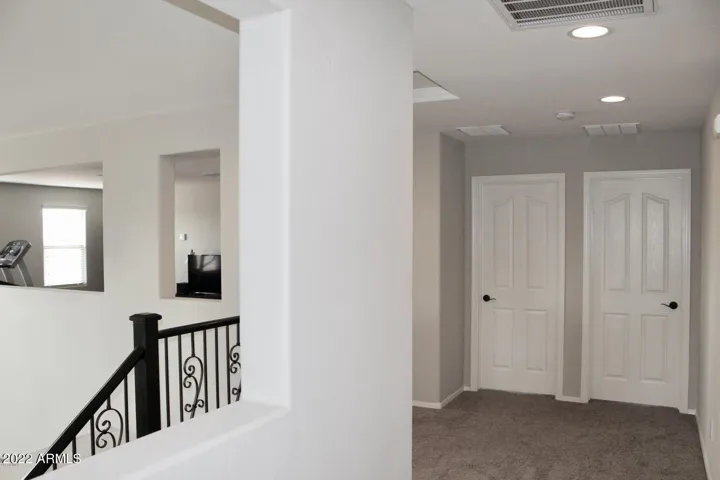 There are three secondary bedrooms and the master upstairs as well as loft.