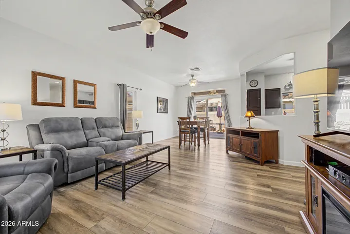 Open concept living space with new luxury vinyl plank flooring.