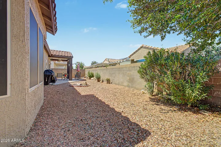 Back yard features low maintenance landscaping.
