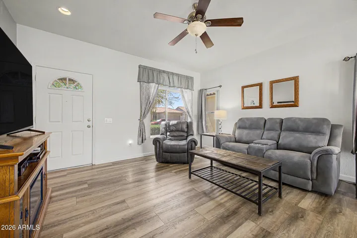 Open concept living space with new luxury vinyl plank flooring.