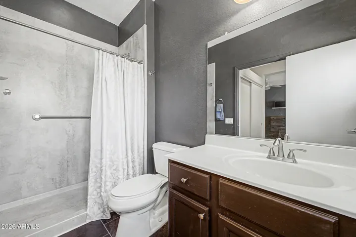 Primary bathroom featuring a beautiful new walk-in shower.