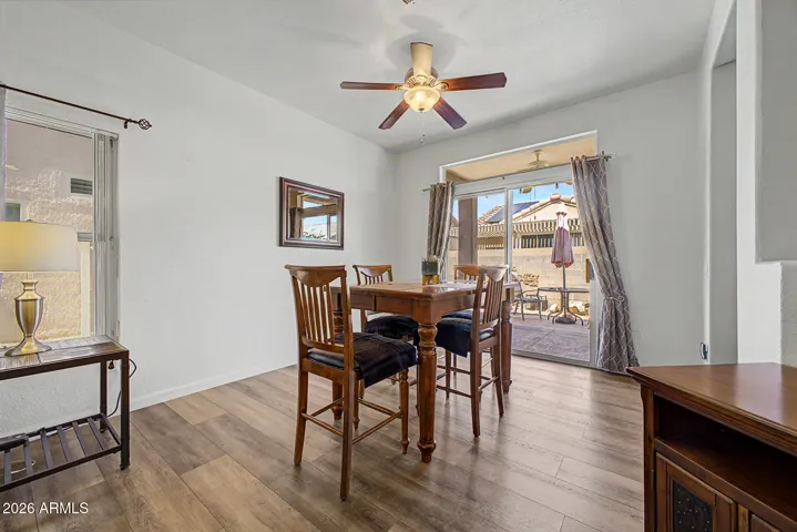 Dining area with arcadia door opening to backyard. Perfect for indoor-outdoor living!