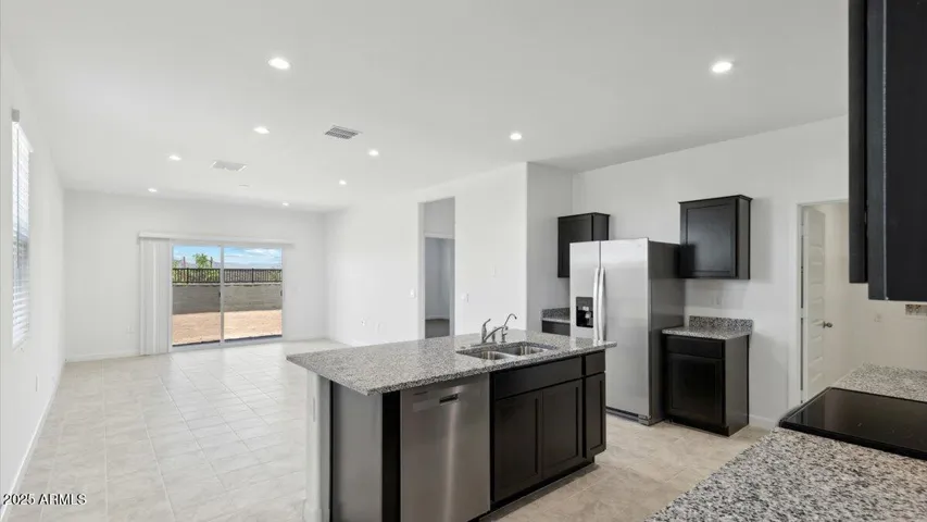 Photos are of a spec and may vary in color, interior selections and design