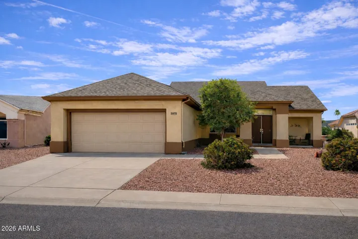 Well-maintained Sun City West home featuring a desirable split-bedroom layout, abundant natural light, and no carpet throughout.