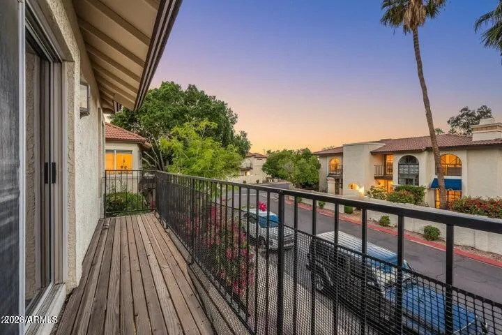 Balcony off master bedroom, facing southwest, excellent susnet views.