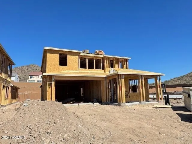 Photo of actual home under construction.
