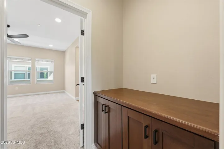 More storage or a coffee bar? This is directly outside the primary bedroom