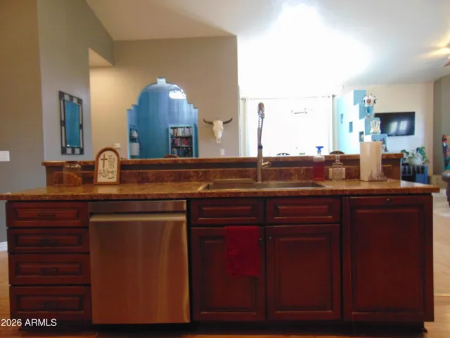 Granite Countertops -Stainless Farm Sink-Pot Filler Faucet-Breakfast Bar- Trash Cabinet