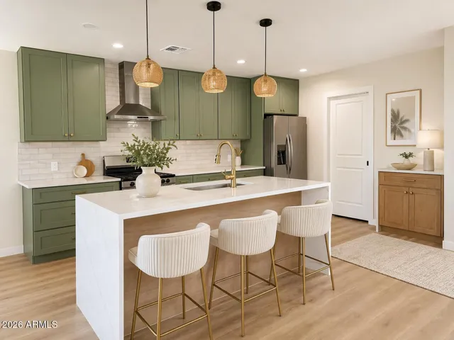 Incredible two toned Kitchen with island and pendant lighting. * Virtually Staged