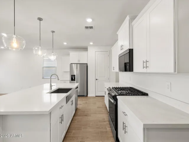 Photo is not of the actual home. Interior finishes and fixtures may vary.