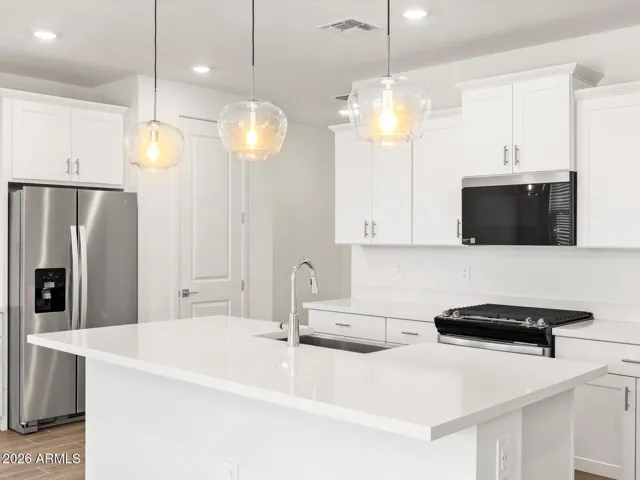 Photo is not of the actual home. Interior finishes and fixtures may vary.