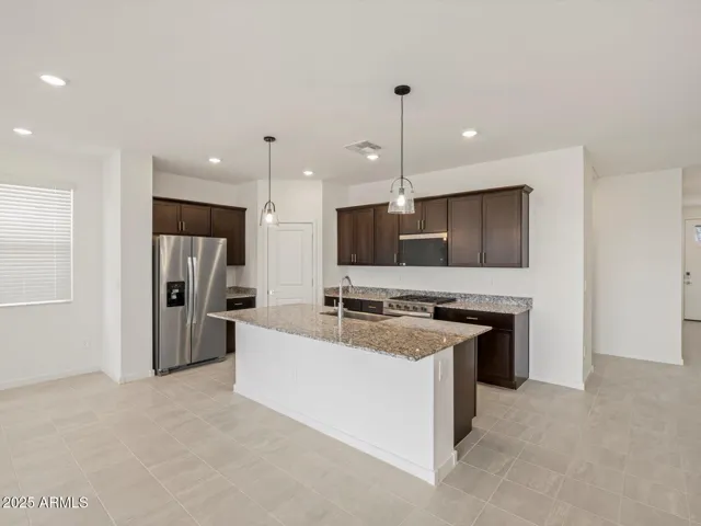 Photo is not of the actual home. Interior finishes and fixtures may vary.