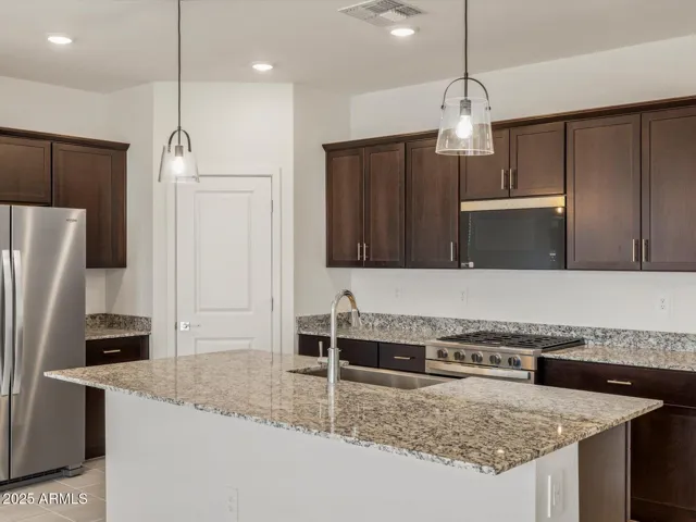 Photo is not of the actual home. Interior finishes and fixtures may vary.