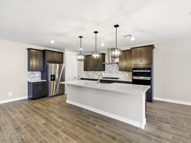 Photo is not of the actual home. Interior finishes and fixtures may vary.