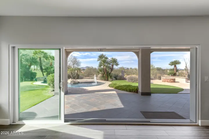 living room with open sliding glass doors