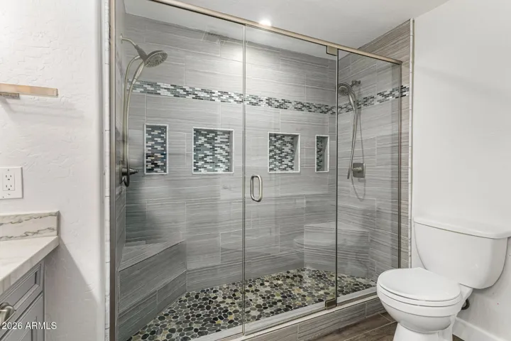large shower with 2 shower heads