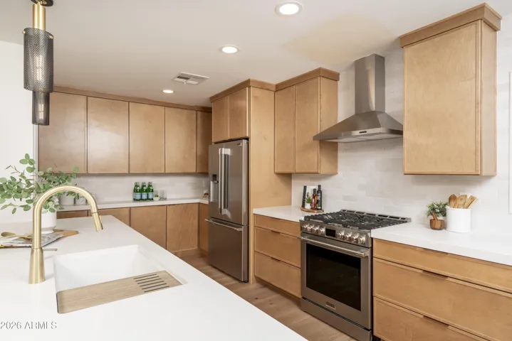 Kitchen with new stainless steel appliances
