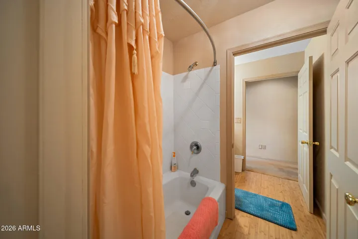 Shared tub/shower combo between 2 powder baths