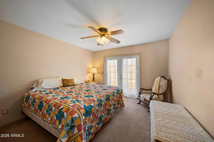 One of the two secondary bedrooms on the main level
