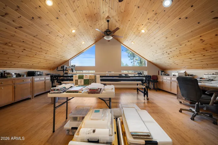Tons of natural light, vaulted ceilings with T&G, can lights