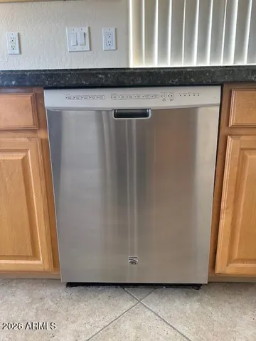 The kitchen is well equipped with granite countertops, stainless steel appliances, reverse osmosis and a walk-in pantry.