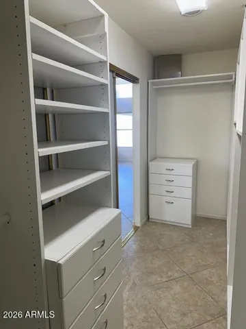 Two banks of drawers are included with the primary closet system.